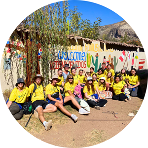 Australian university students work on a renovation project at a local school in Peru as part of an overseas volunteer program